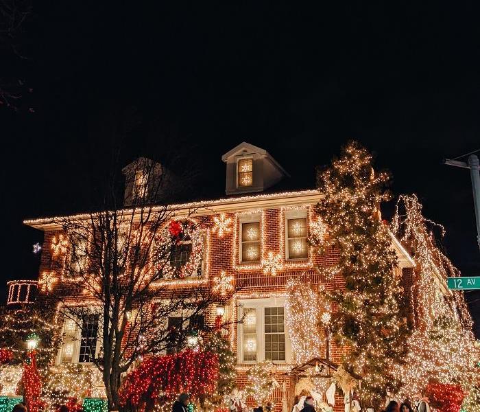 house with Christmas Lights