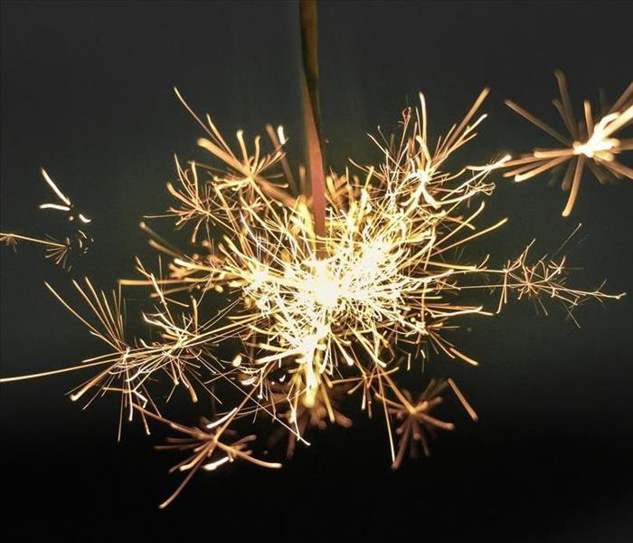 Lit sparkler firework 
